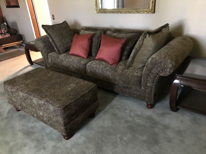 big ole floral couch- plenty of comfy. rough dimensions, in inches, 100w x 43d x 40h. Comes with matching ottomon 19h x23.25l x 43w. $300