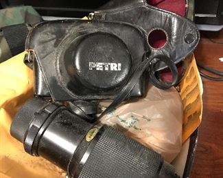 Petri 35mm camera  $40
Tamaron 2 lens for Minolta $40