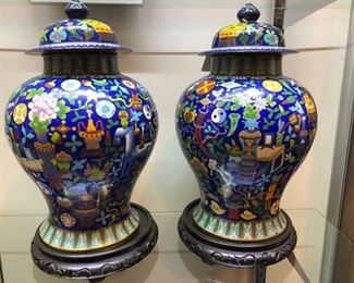 Matched signed pair of large cloisonne vases on stands. These are very colorful, and they are magnificent in person.