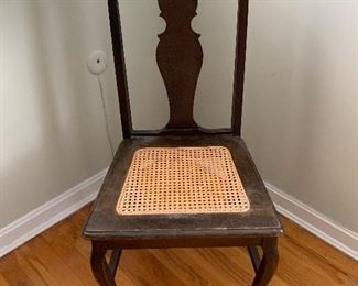 Cane side chair. Condition good.  Dimensions 15"D x 17"W x 37"H      Price $50