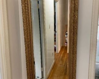 Gold framed mirror. Condition good. Dimensions 46"H x 24"W    Price $95