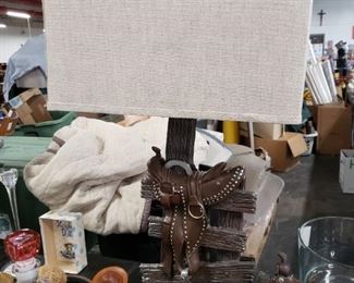 Crestview cowboy saddle lamp with linen shade like new 
     $100