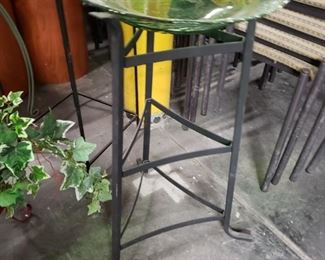 Black painted metal stand with green transparent bowl $85