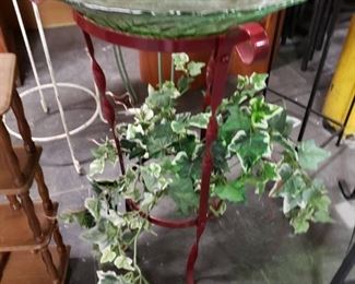 Burgundy painted metal stand with green transparent bowl $85