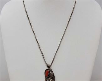 911       Sterling Silver Necklace with Coral and Turquoise Pendent.
.925 Sterling Silver Necklace, Weighs Approx 11g, Measures Approx 20"