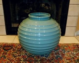 Large Aqua/Teal? color vase. Excellent condition. Can be used as a planter, as it has a hole in the bottom. Size: 16" tall, 17" wide, opening in top is 7". $20