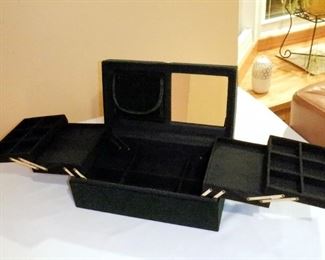 Dark forest green velour covered jewelry box.  Mirror, pouch w/4 zippered sections, four raised trays (2 sectioned, 2 for rings), 4  sections in bottom.  Looks brand new.   12-1/8" wide, 6" tall.   $9 (was $12)