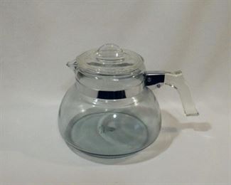 Rare, Pyrex Flameware tea kettle in super nice vintage condition.  Blue tinted glass with the green stamp (1930's) on the bottom.  No chips, cracks or rust on the metal parts.  Hold almost 3 quarts!   $40 (was $45)
