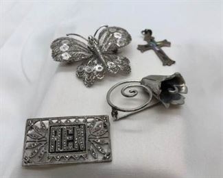 Sterling silver pins & cross pendant https://ctbids.com/#!/description/share/373705