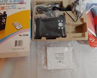 Hand-held TV & Polaroid camera new in packaging https://ctbids.com/#!/description/share/373767