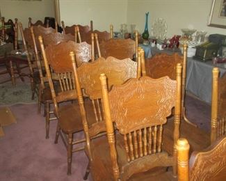 SET OF TWELVE Pressed back American Victorian style Kitchen chairs. I would suggest that they are 40 years old. The family paid $99 PER chair, or around $1100 plus sales tax for the lot. $375 is the price!