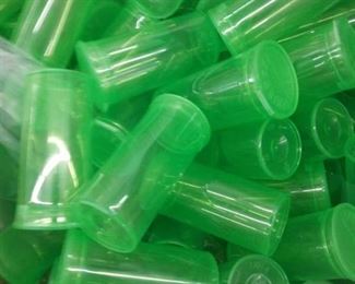 lot of bulk green plastic pill bottles
