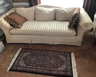 3 seat couch $35
Small carpet $18