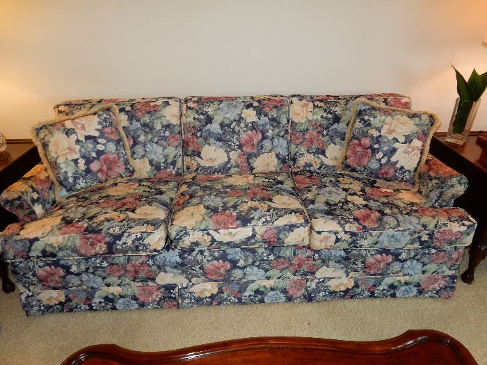 $250     Flowered upholstery sofa  