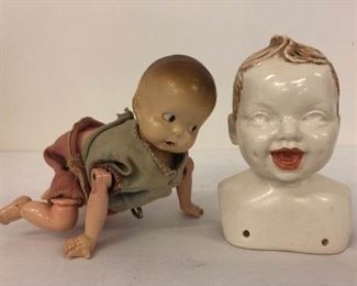 Vintage Windup Baby toy and Porcelain Doll Head