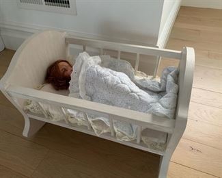 Wooden baby doll bed and dolly.  $40