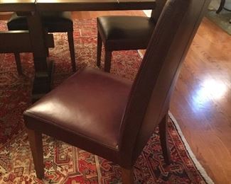 Pottery Barn all leather dining chairs.  Qty 6  Must take all  $299 each ($1794.00 total)  One chair has one small scuff