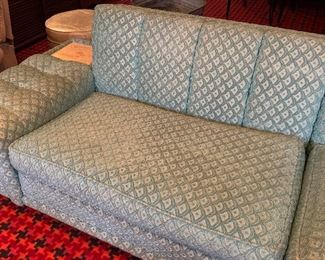 Now $385! $550. Amazing; 1950's curved sectional in a beautiful shade of light aqua blue with little flecks of sparkle. In very good condition! Some minor staining only on the lower back of the couch. No stains on the front of the sofa. 