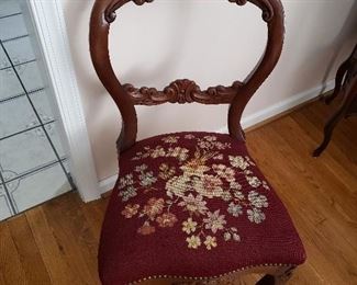 Balloon back walnut chair with needlepoint seat.   $45 ea