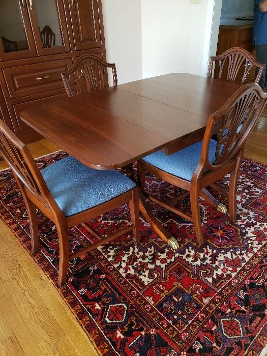 Duncan Phyfe drop-leaf dining table with 4 chairs.  $480