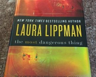 The Most Dangerous Thing by Laura Lippman. Signed First Edition. In Protective Mylar Cover. $15.  