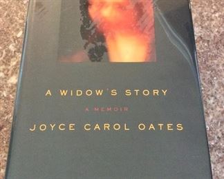 A Widow's Story: A Memoir by Joyce Carol Oates. Signed First Edition. In Protective Mylar Cover. $15. 