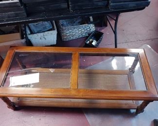 Wood with Glass Inlay Coffee Table  $150.00  52.5” x 21” x 16”  #HWW64