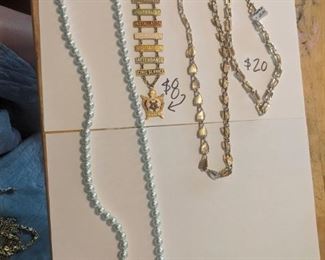 Pearls on left are SOLD  The gold thing next to it is SOLD as well.