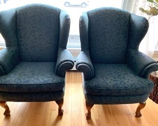 Now $25!   $45-Pair of upholstered high-back chairs in two tones of blue with a leaf pattern design and claw feet. One of the chairs is in poor condition and one is in very good condition. (poor condition chair has a stain on the seat and broken springs in the back) Price is basically, buy one and get the one that needs repair. Chairs each measure 34" arm to arm, seats measure 27"w x 19.5" and the back is 29" tall.