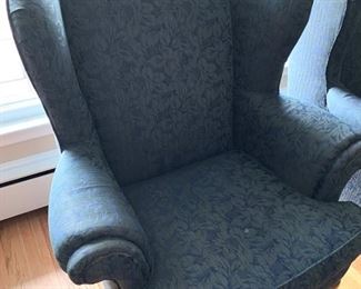 Now $25!  --$45-Pair of upholstered high-back chairs in two tones of blue with a leaf pattern design and claw feet. One of the chairs is in poor condition and one is in very good condition. (poor condition chair has a stain on the seat and broken springs in the back) Price is basically, buy one and get the one that needs repair. Chairs each measure 34" arm to arm, seats measure 27"w x 19.5" and the back is 29" tall.
