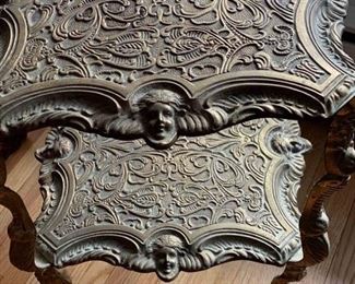 Now $50-$85 -Metal three-tiered plant stand/accent piece with figural and beautiful accents. Approximately 13.5"square on the top and 31.25" tall. Held together by screws and needs a little tightening. 