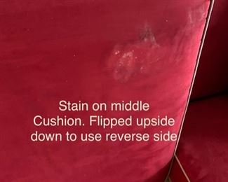 Now $185! -$250- Super comfortable microsuede vibrant red sofa with four matching throw pillows. No manufacture name. No tears in fabric, but two staining issues- one on the back left arm and the middle cushion has a stain and has been turned upside down. (see all photos)  Has light tan piping. Measures approximately 103.5" long by 42" deep and 30.5" tall in the back and 27" tall in front. The cushions measure 30" deep 26.5" wide. 