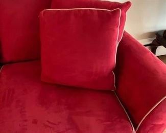 5! -$250- Super comfortable microsuede vibrant red sofa with four matching throw pillows. No manufacture name. No tears in fabric, but two staining issues- one on the back left arm and the middle cushion has a stain and has been turned upside down. (see all photos)  Has light tan piping. Measures approximately 103.5" long by 42" deep and 30.5" tall in the back and 27" tall in front. The cushions measure 30" deep 26.5" wide. 