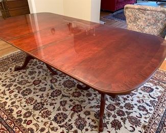 Now $150!  $195 -Very nice large dining room table and six chairs. Approximately 68" x 43" wide with the leaf adding 15" (two leaves measuring 15" each) One noticeable "ding" on the top. (ding measures approximately .75" long by .25" wide) Table is cherrywood with a veneer top and has rounded corners and an inlaid design. 