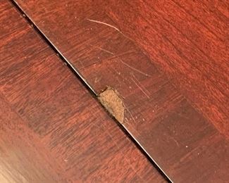 Now $150!  $195 -Very nice large dining room table and six chairs. Approximately 68" x 43" wide with the leaf adding 15" (two leaves measuring 15" each) One noticeable "ding" on the top. (ding measures approximately .75" long by .25" wide) Table is cherrywood with a veneer top and has rounded corners and an inlaid design. 