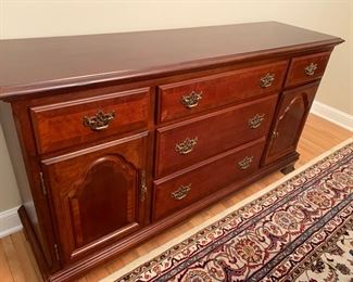 $100-Buffet Server. No scratches on top. 5 drawer storage with two cabinets doors for additional storage. Forgot to measure this one- sorry.