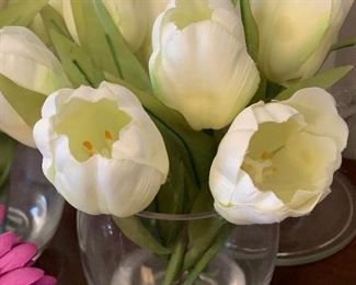 $10- Lot of home decor items; two hurricane holders about 12" tall, 2 faux Lilly's in vases and 6 mini vases with purple daisies. 