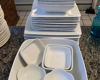 $35- Lot of white dishes by Target Home. Perfect for that college student heading to college in the fall! 8 dinner plates (10.25" across), 8 salad plates (8.25") 7 square bowls (6"), 5 larger square bowls (7.25"), circular bowls, smaller bowls, larger serving bowl and 6 coffee mugs.