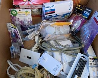 $12- Misc household items. lightbulbs, ext cords, hooks, Air Wick plug ins and whatever else we threw in this catch-all box! 