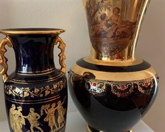 $15- two decorative vases. Small one has a small chip on handle which could be fixed with a dab of gold paint and measures 10.5" tall and the large one is glass and measures 14" tall with a 6.5" opening. 