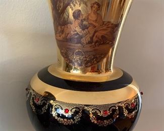 $15- two decorative vases. Small one has a small chip on handle which could be fixed with a dab of gold paint and measures 10.5" tall and the large one is glass and measures 14" tall with a 6.5" opening. 