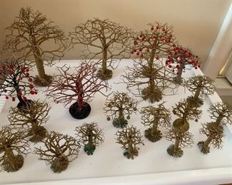 Now $40 $60-  Lot of decorative metal twist trees. 20 in total with the tallest measuring about 9.5" and the smallest one 2.5" tall.