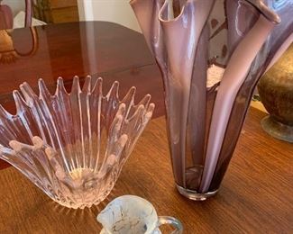 $15- three decorative items. The large fluted purple and white vase measures 14" tall by 9" across. The clear fluted style "vase" measures about 10" across and 7" tall. Bonus little art glass creamer - 4" tall 