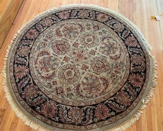 $50-Round area rug- Approximately 49" 