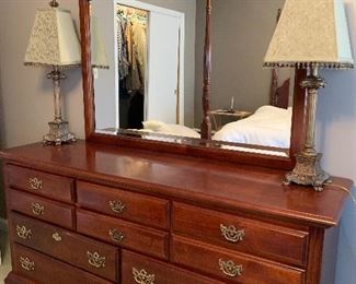 NOW $700!!---$1,200- GORGEOUS king bedroom SET. Includes Furniture by American Drew and features a high boy measuring approximately 7' tall by 38" wide at the bottom and 33.2" wide on the top.  Dresser with large.  mirror includes ten drawers for ample storage measuring 66" long by 19" wide. Also includes a four poster very beautiful bed with a mattress (NO stains) by Spring Air which honestly feels like you are sleeping on a cloud!. Set INCLUDES, sheets, a white comforter, and several pillows and extra blankets. 