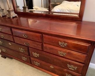 NOW $700!!---$1,200- GORGEOUS king bedroom SET. Includes Furniture by American Drew and features a high boy measuring approximately 7' tall by 38" wide at the bottom and 33.2" wide on the top.  Dresser with large.  mirror includes ten drawers for ample storage measuring 66" long by 19" wide. Also includes a four poster very beautiful bed with a mattress (NO stains) by Spring Air which honestly feels like you are sleeping on a cloud!. Set INCLUDES, sheets, a white comforter, and several pillows and extra blankets. 