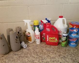 $12- Lot of misc cleaning products and aerosol fragrance dispensers.