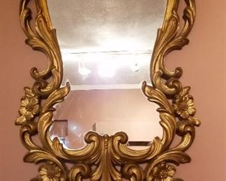 $16-Beautiful gold wall mirror with shelf. Some damage on the shelf.  Measures 35"×16"