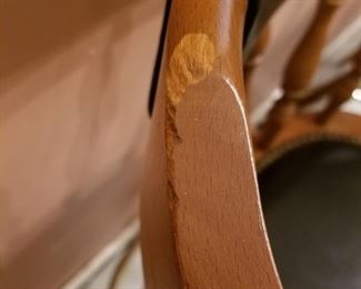 $40-Set of 4 wood and black leather barstools. Measure 42" high and 20" width between arms, seat is 31" high. Scuffed wood on all upper wood chair back