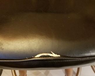 $40-Set of 4 wood and black leather barstools. Measure 42" high and 20" width between arms, seat is 31" high. Scuffed wood on all upper wood chair backs. 2 seats with slight damage 